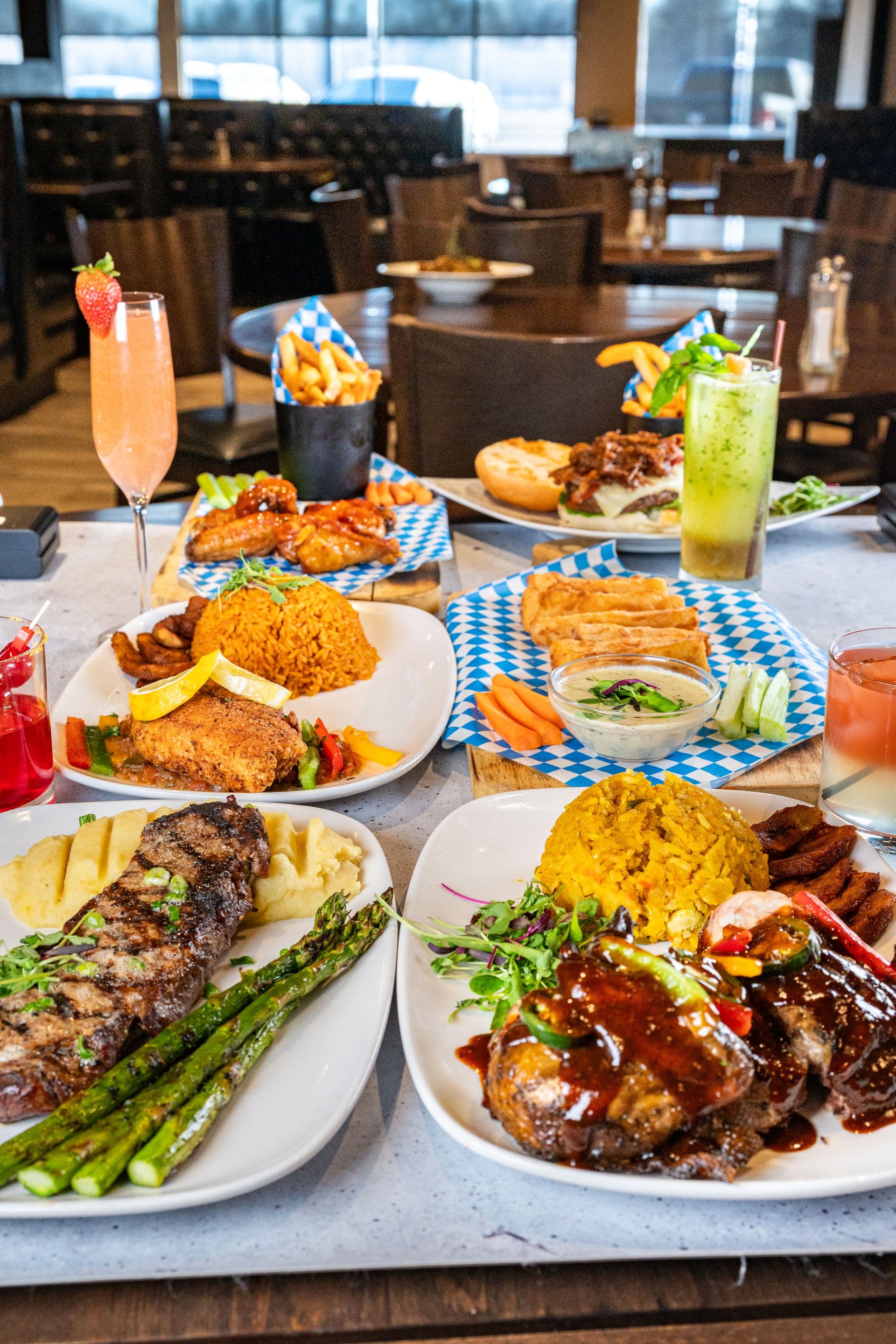 Spread of dishes and cocktails from the BB's wood-fire kitchen