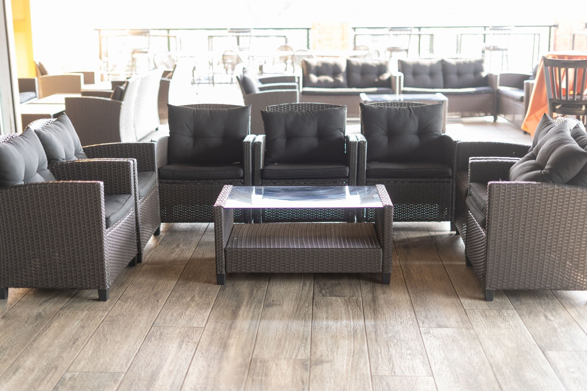 Covered lounge seating on the rooftop at BB's Events & Restaurant